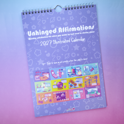 A spiral-bound 2027 illustrated wall calendar titled "Unhinged Affirmations: Monthly affirmations for when you wake up and need to choose chaos" lying on a pastel pink-to-blue gradient background. The cover is lavender with white text and pastel cartoon illustrations across the lower half.
