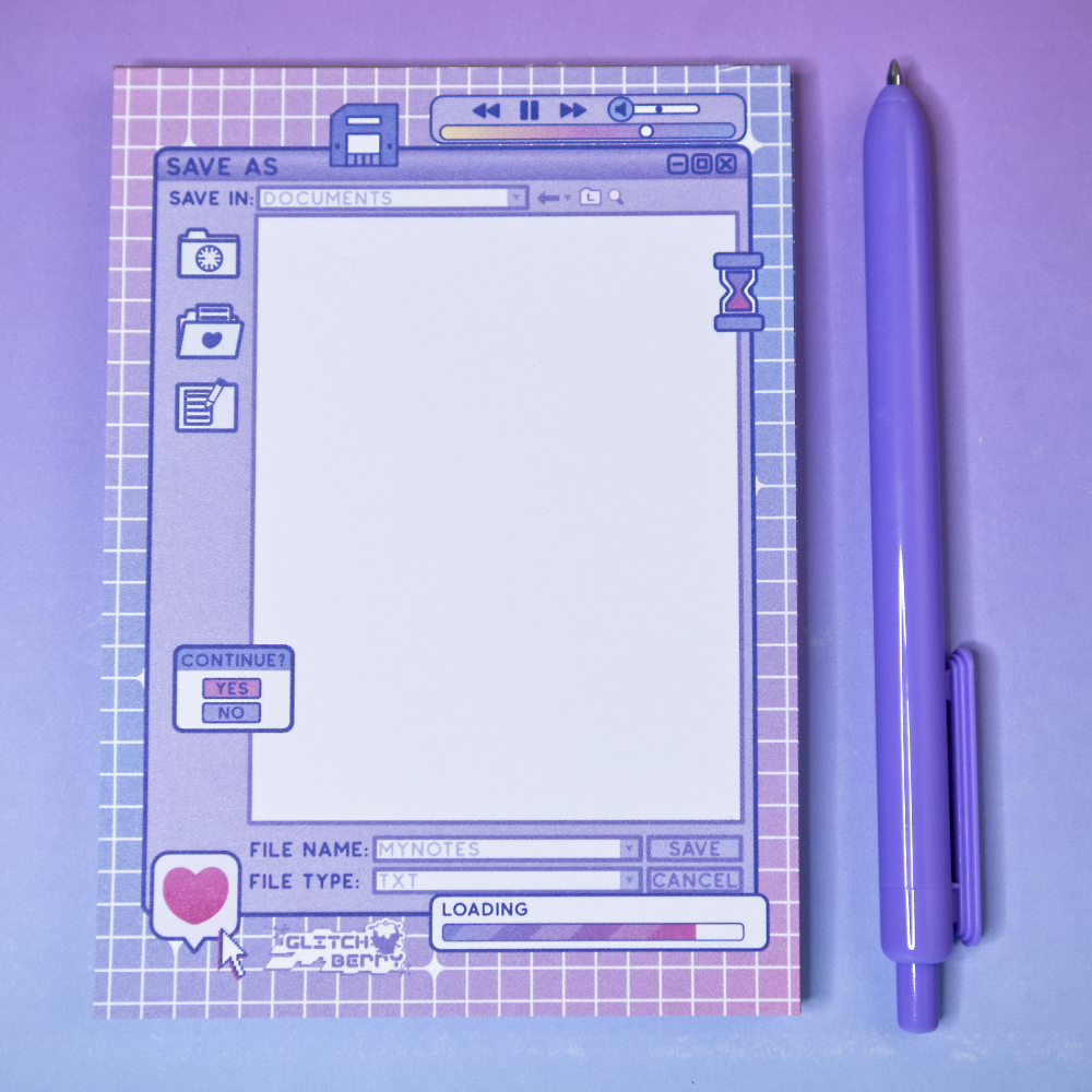 Notebook with retro computer interface design on a purple background, accompanied by a matching pen.