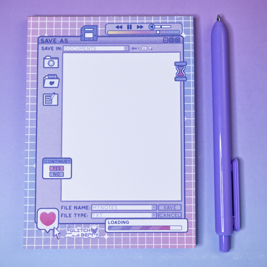 Notebook with retro computer interface design on a purple background, accompanied by a matching pen.