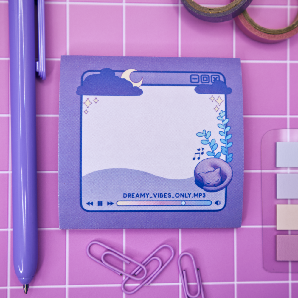 Purple sticky note pad with music player design featuring a cat and a plant on a pink grid background