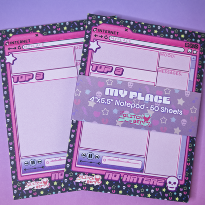 Notepad with a pink emo-themed design on a purple background