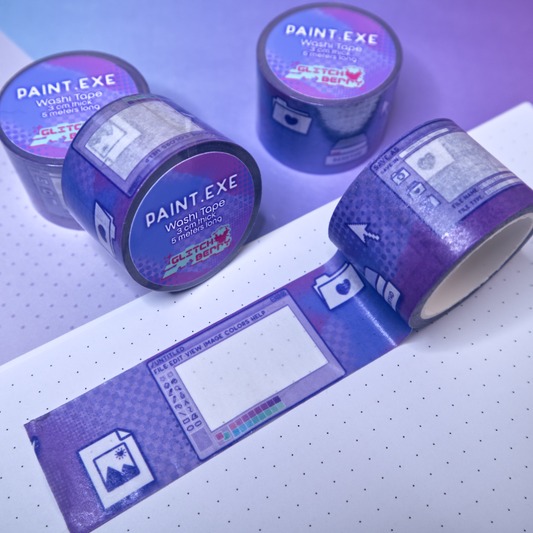 Roll of purple tape with digital paint program designs on a white surface.