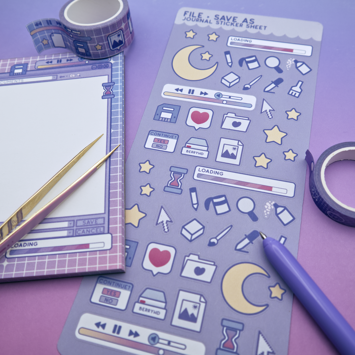 Sticker sheet with various computer icons on a purple background, with a pen and washi tape visible.