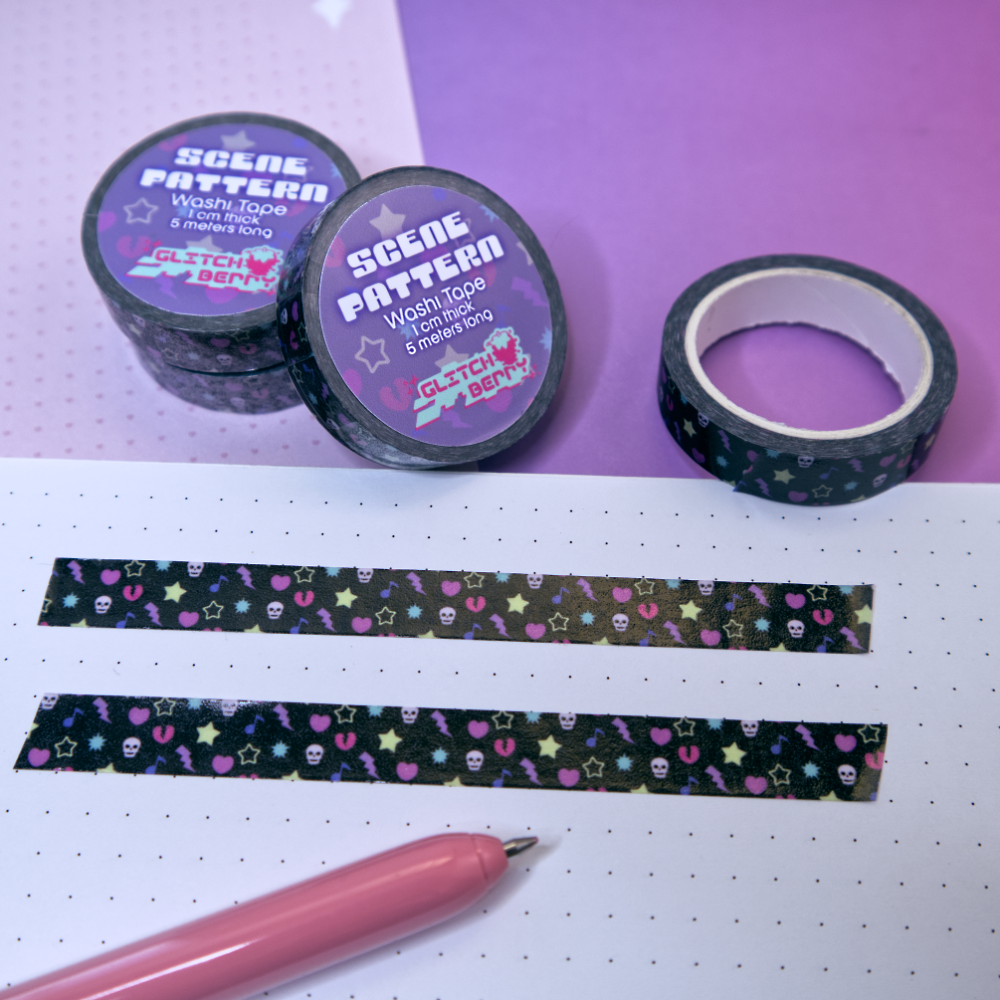 Washi tape with colorful emo-themed patterns on a white and purple background
