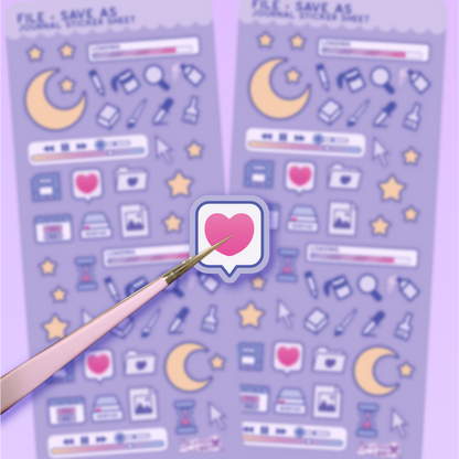 Two sheets of decorative stickers with computer icons on a purple background.  Tweezers are holding a heart sticker in the foreground.