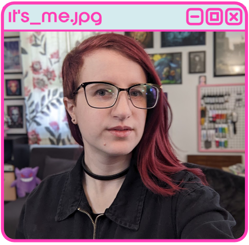 photo of a woman with dyed red hair and glasses